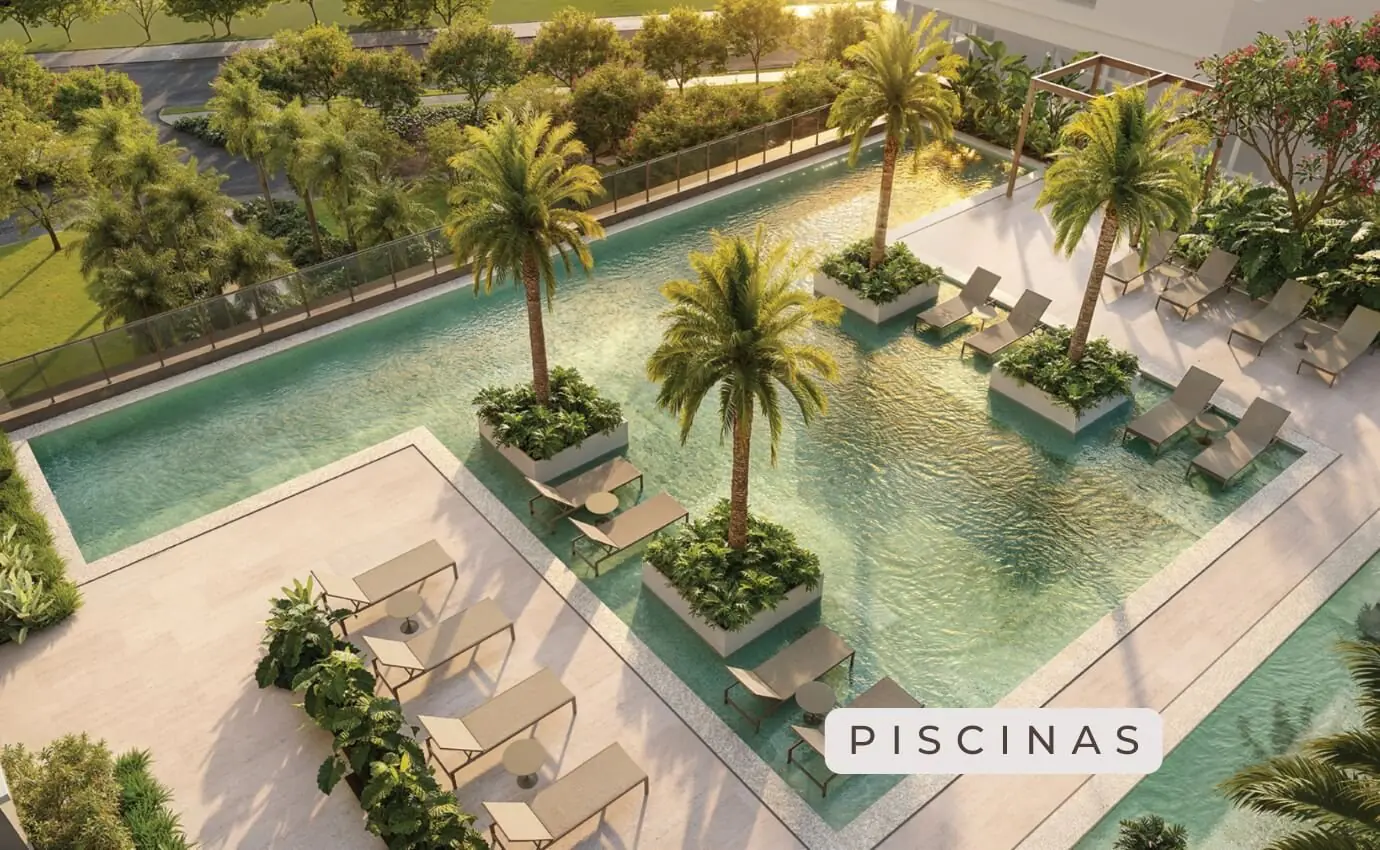 Luxuosa área de lazer com piscinas e paisagismo exuberante em SP